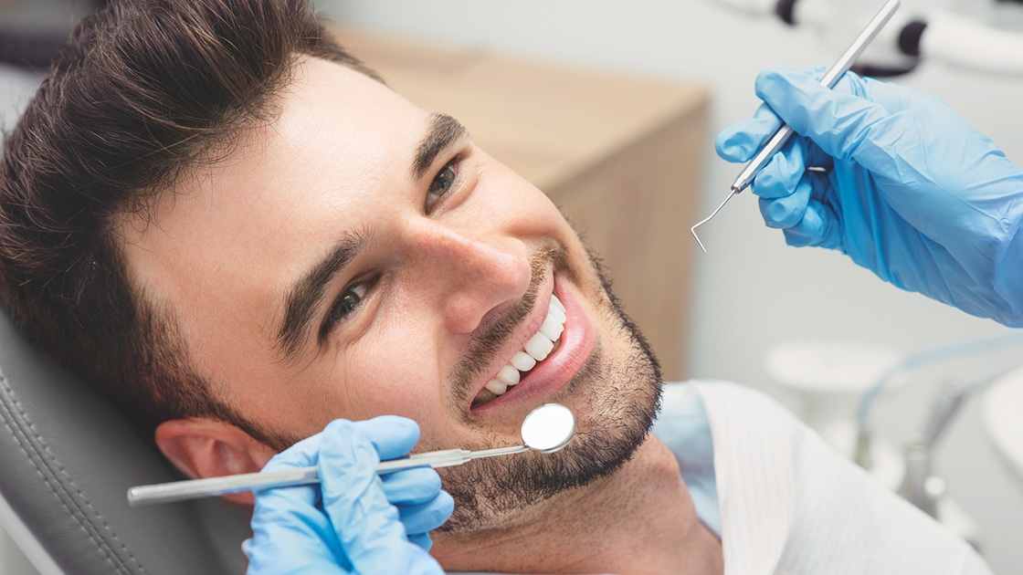 Male Patient in Dental Chair